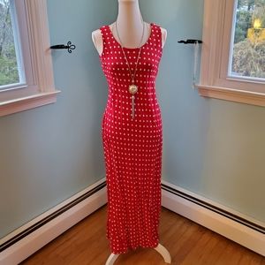 Sleeveless red and white polka dot dress.